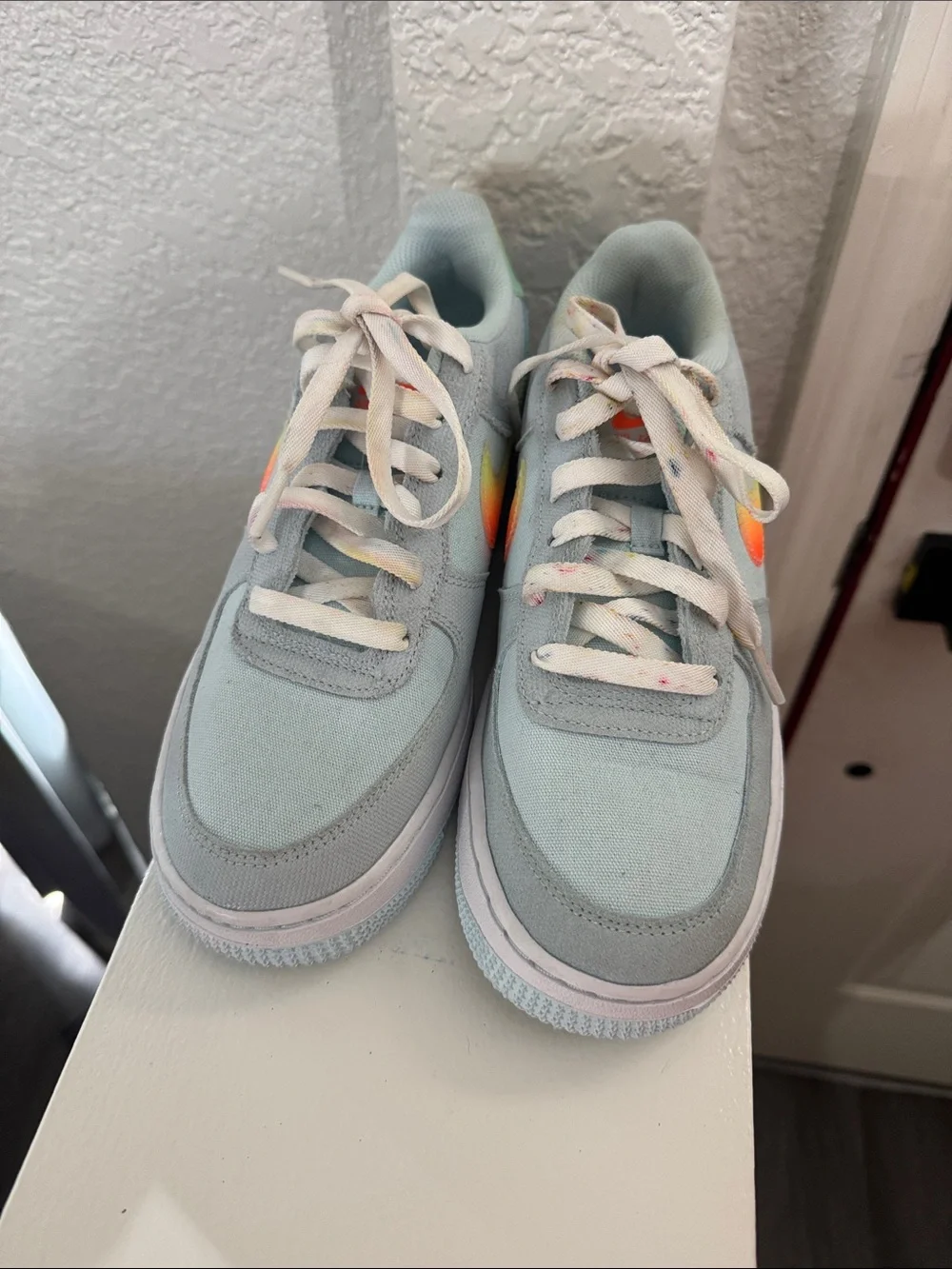 Nike Kids Light Blue Canvas Sneakers with Rainbow Gradient Swoosh